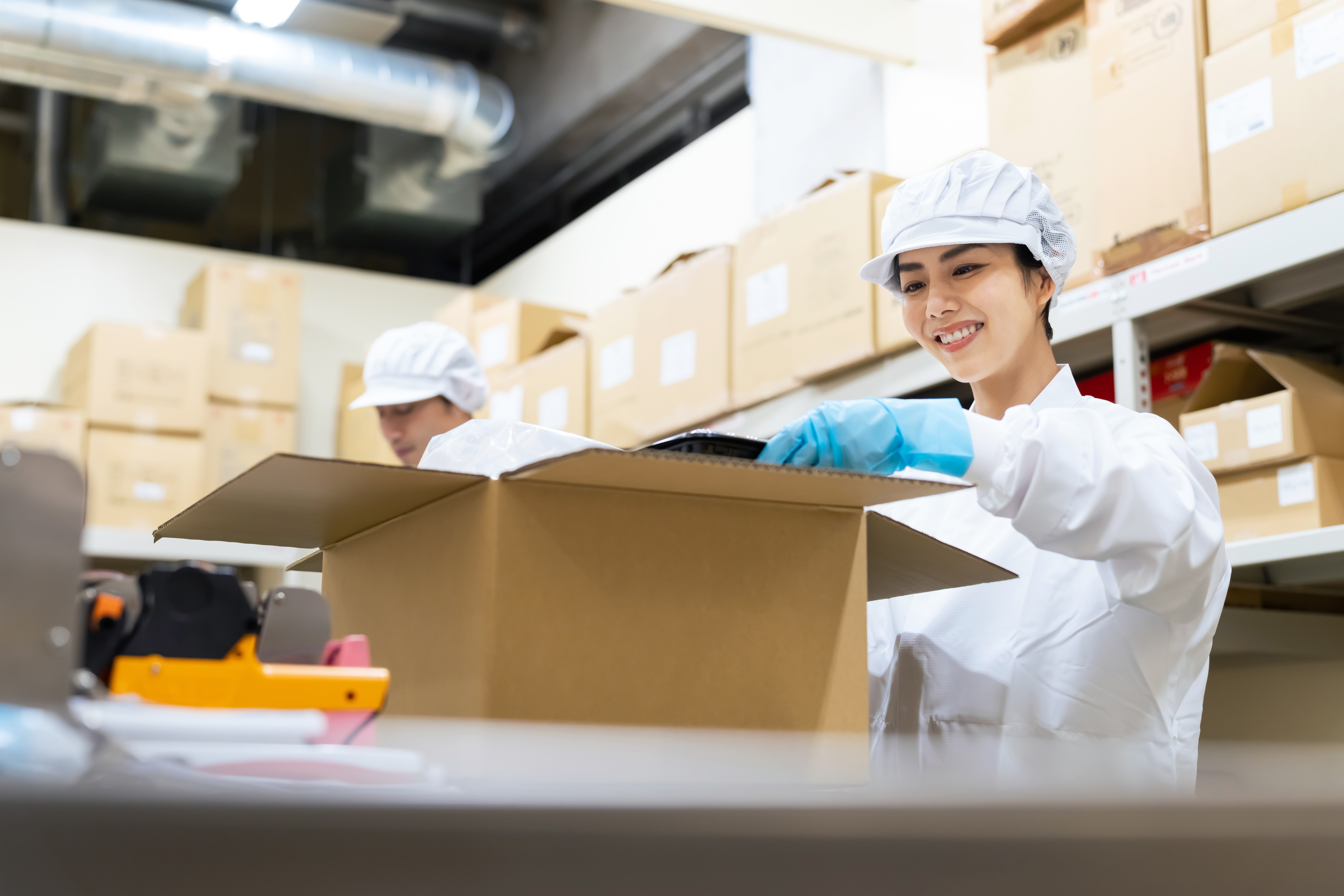 A,Woman,Packing,Food.,Supply,Center,Of,Meals.,Delivery,Food.