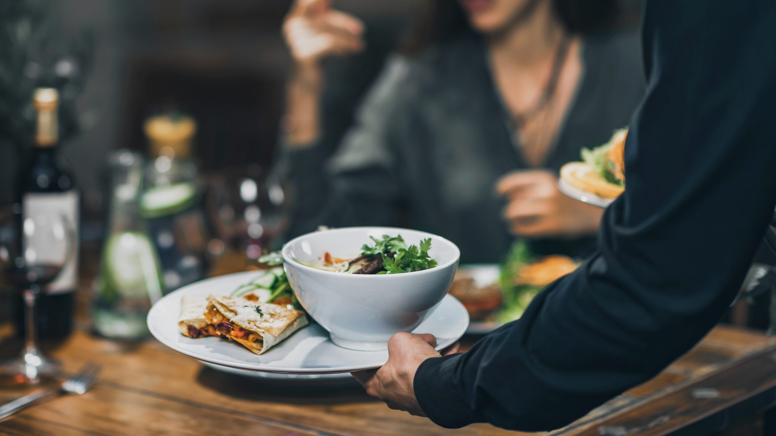 Horizontal,Image,Of,Male,Hand,Serving,Plate,Of,Vegetarian,Dinner